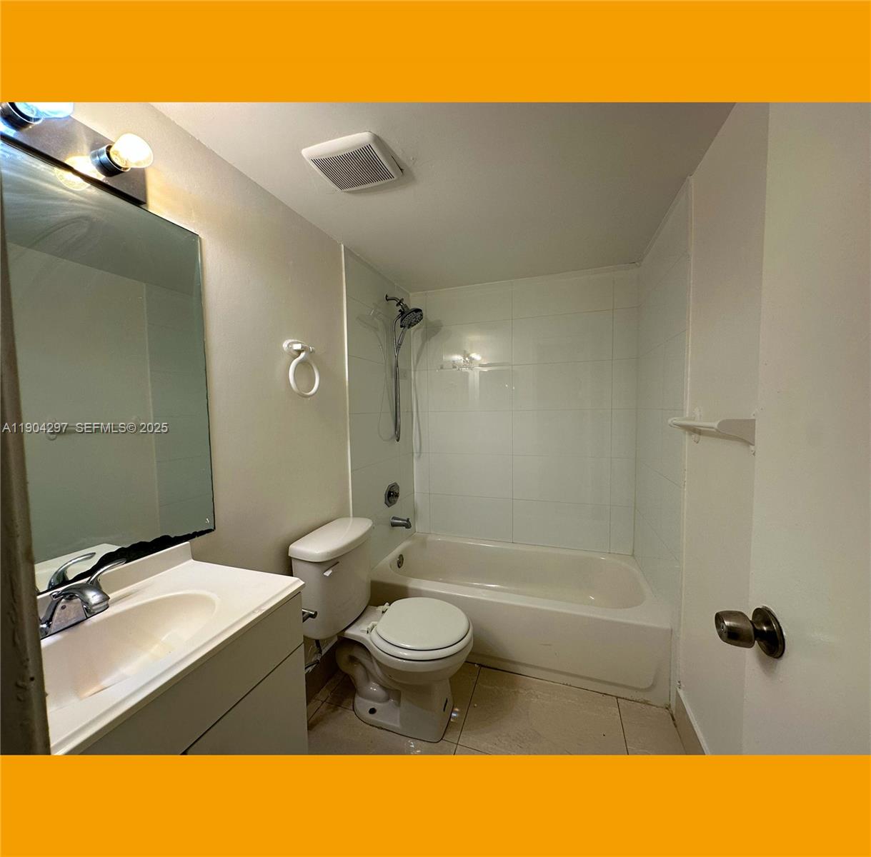 3396 Foxcroft Road, Unit 305 Miramar, FL 33025 - Photo 13 of 20 a bathroom with a sink toilet a mirror and shower