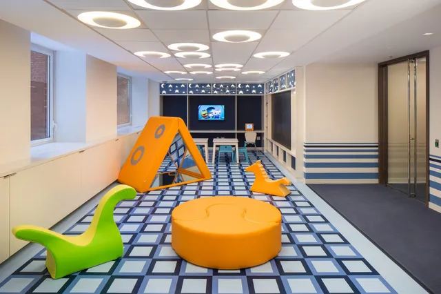 a view of a livingroom with a floor to ceiling window