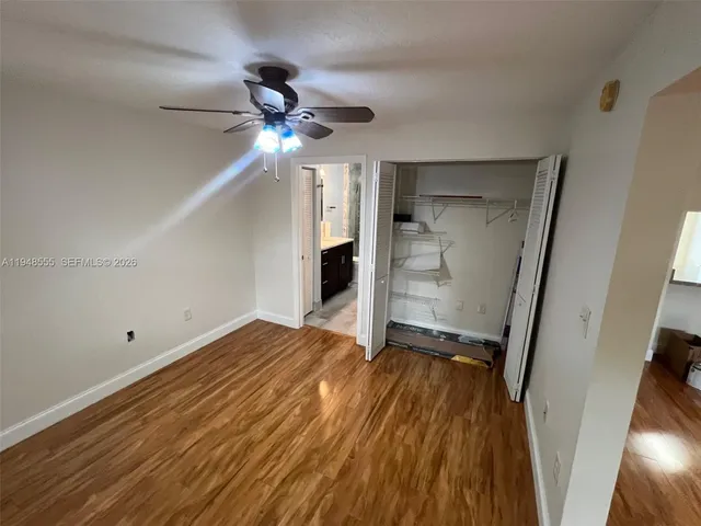 a bathroom with a shower and toilet