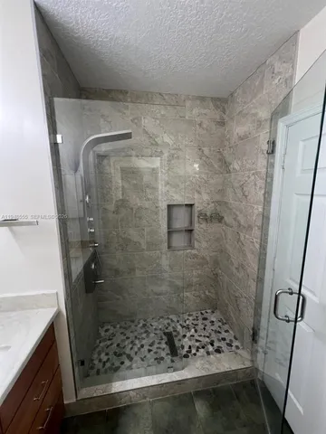 a front view of house with yard outdoor seating and green space