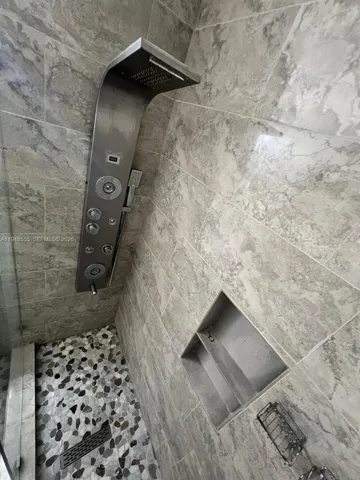 a view of a swimming pool with a yard