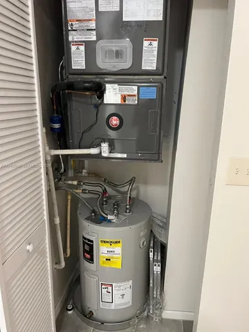 an aerial view of a house with yard and outdoor seating