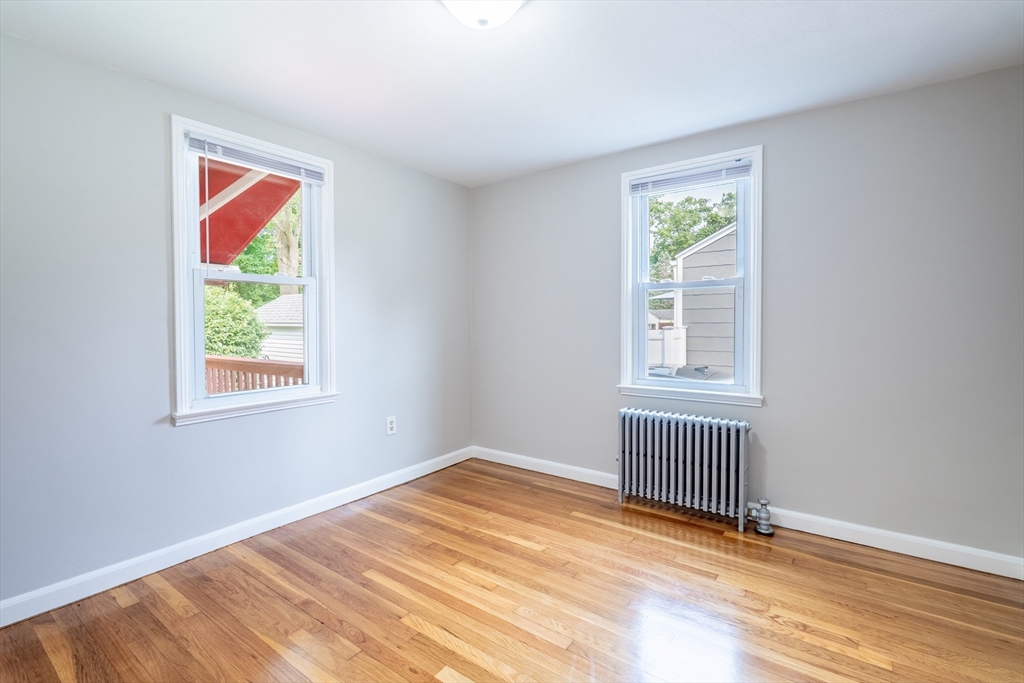 58 Gilman Street Springfield, MA 01118 - Photo 14 of 18 an empty room with window