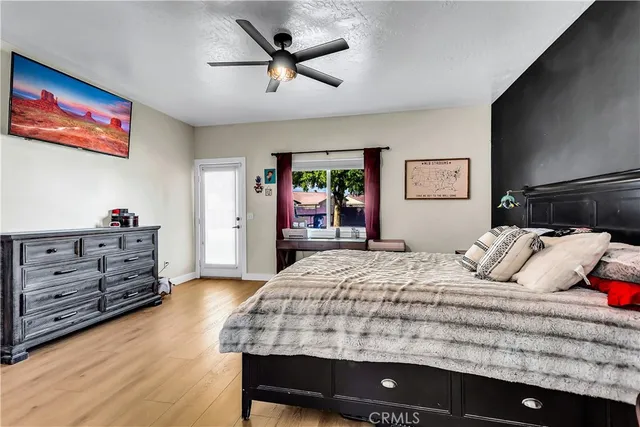 a large kitchen with a stove and a refrigerator