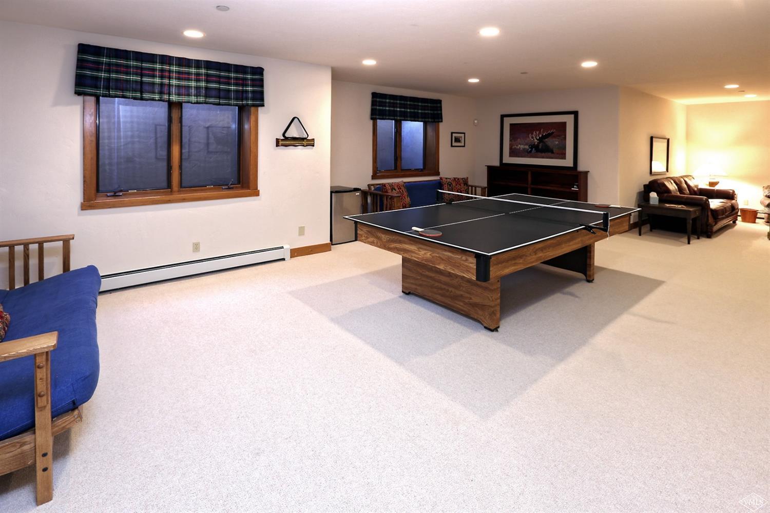 24 Clubhouse Circle Edwards, CO 81632 - Photo 14 of 17 a living room with furniture a wooden floor and kitchen view