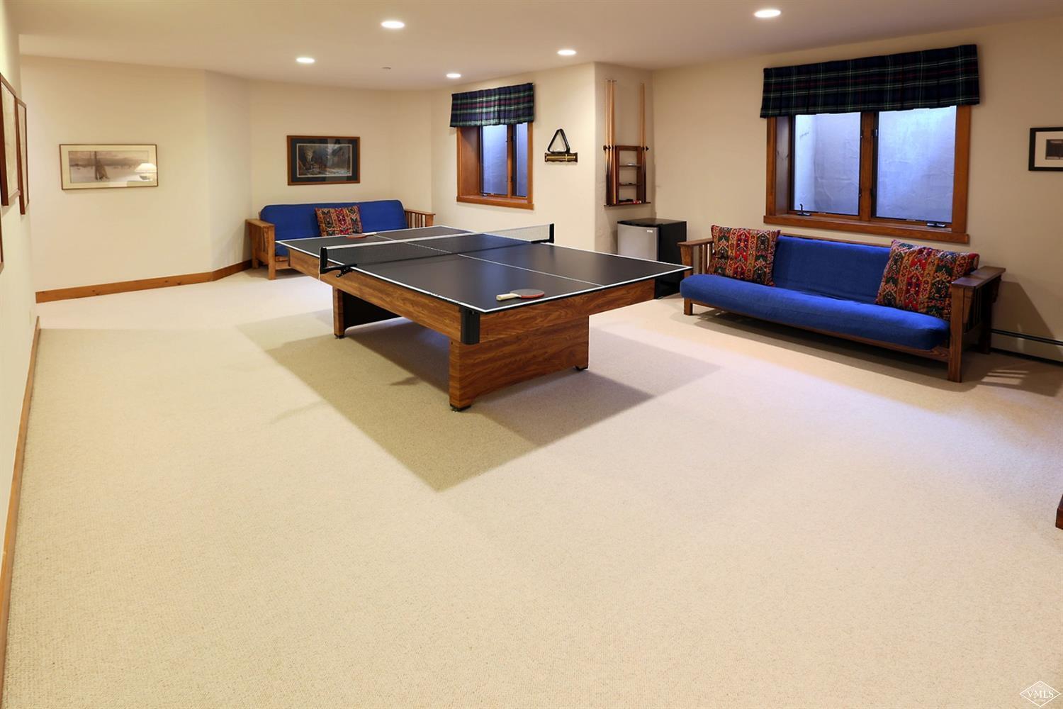 24 Clubhouse Circle Edwards, CO 81632 - Photo 15 of 17 a living room with furniture a pool table and a window