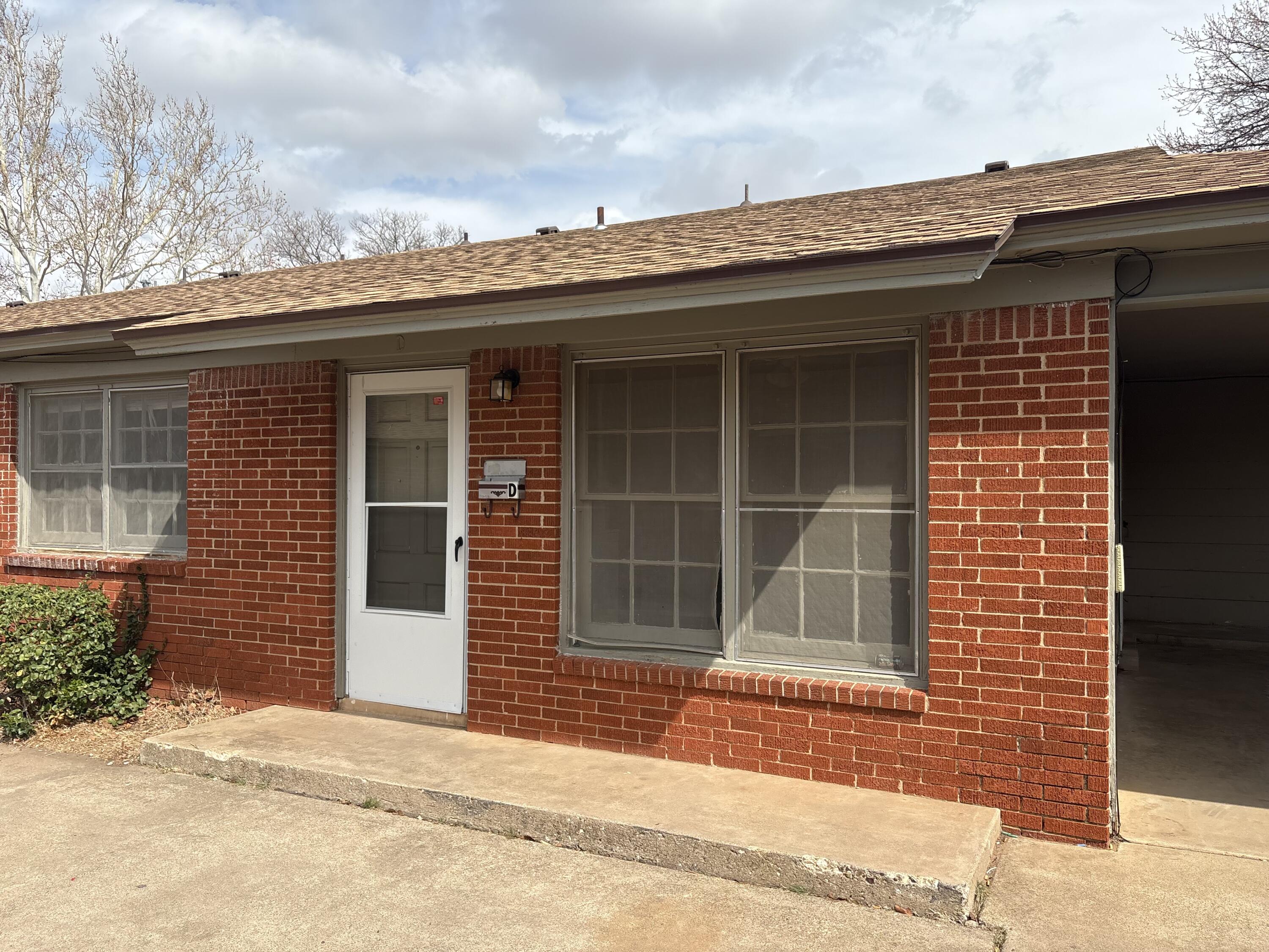 4203 50th Street, Unit D Lubbock, TX 79413 - Photo 1 of 4 79443479551__97C6F374-B7D0-4D67-A896-411