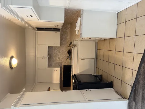 a bathroom with a sink and a shower