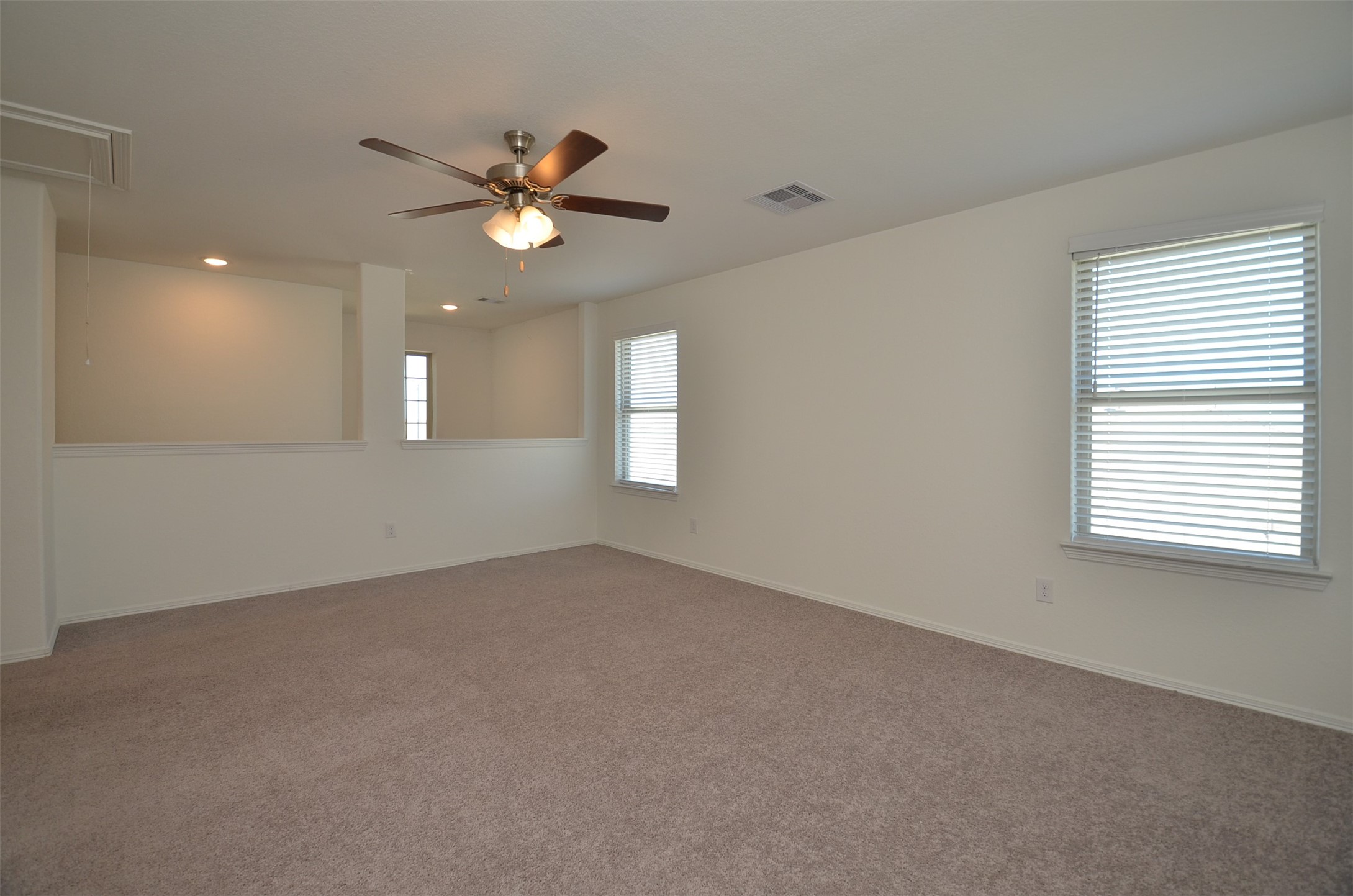 5602 Tabula Rasa Drive Katy, TX 77493 - Photo 18 of 38 a view of an empty room with a window