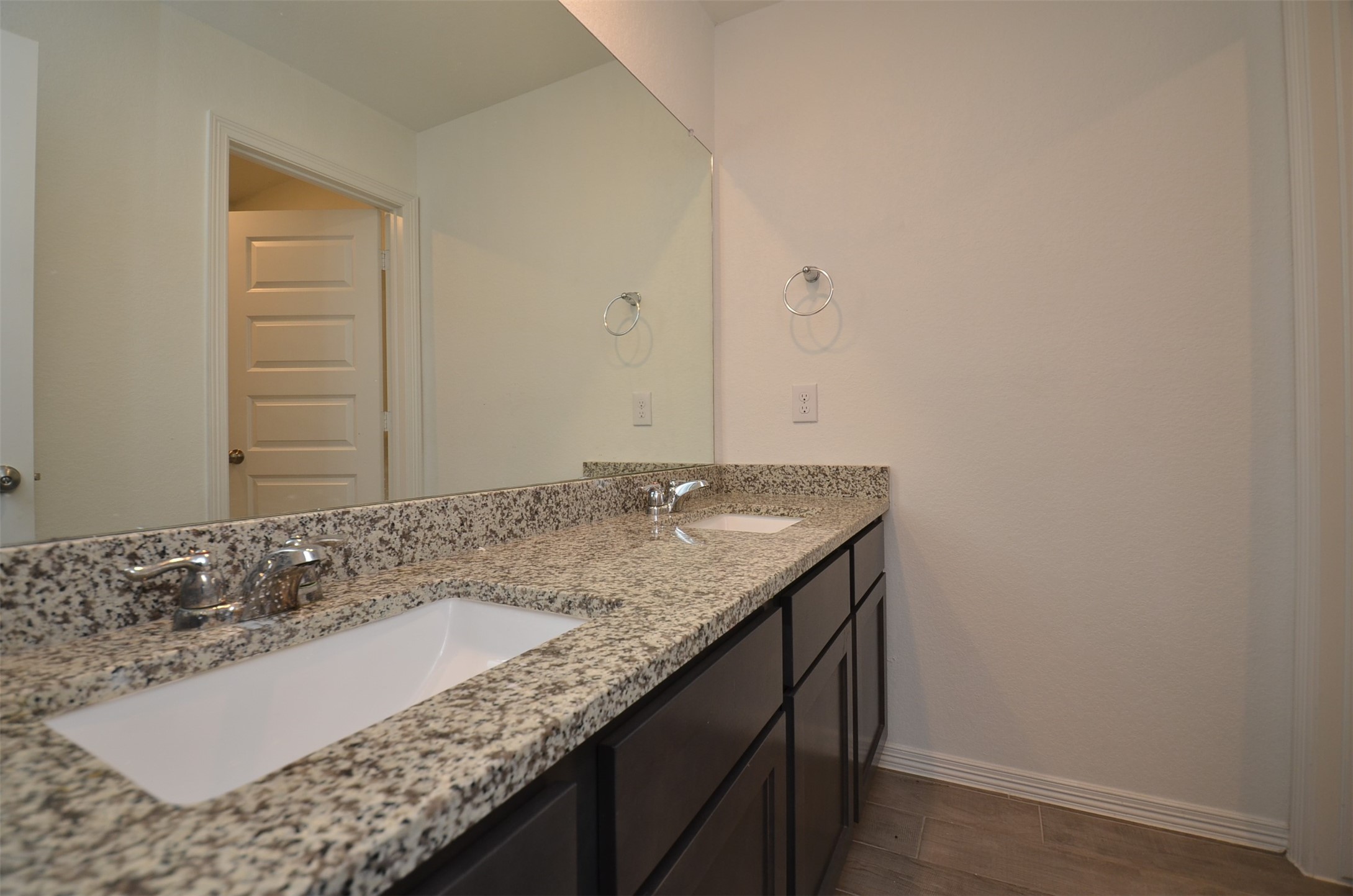 5602 Tabula Rasa Drive Katy, TX 77493 - Photo 21 of 38 a bathroom with a granite countertop sink and a mirror