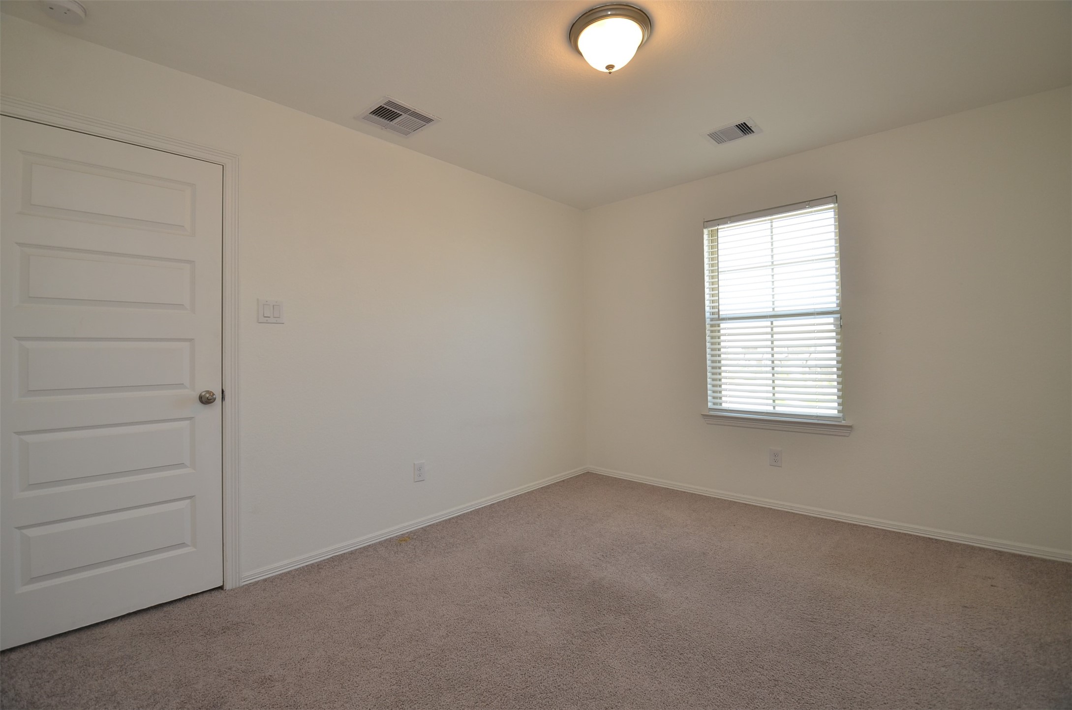 5602 Tabula Rasa Drive Katy, TX 77493 - Photo 24 of 38 an empty room with a window