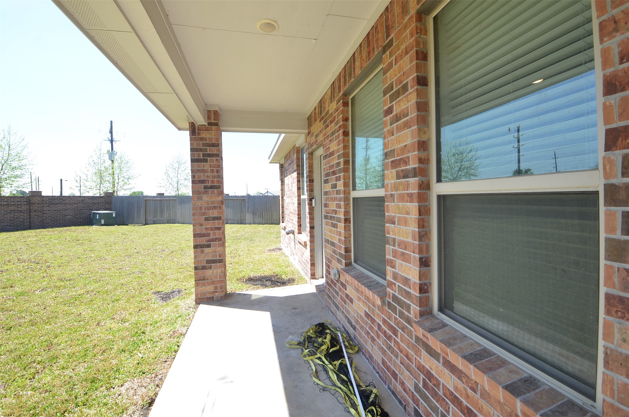 5602 Tabula Rasa Drive Katy, TX 77493 - Photo 31 of 38 a view of a balcony with floor to ceiling windows