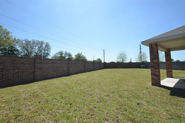 a house with trees in the background