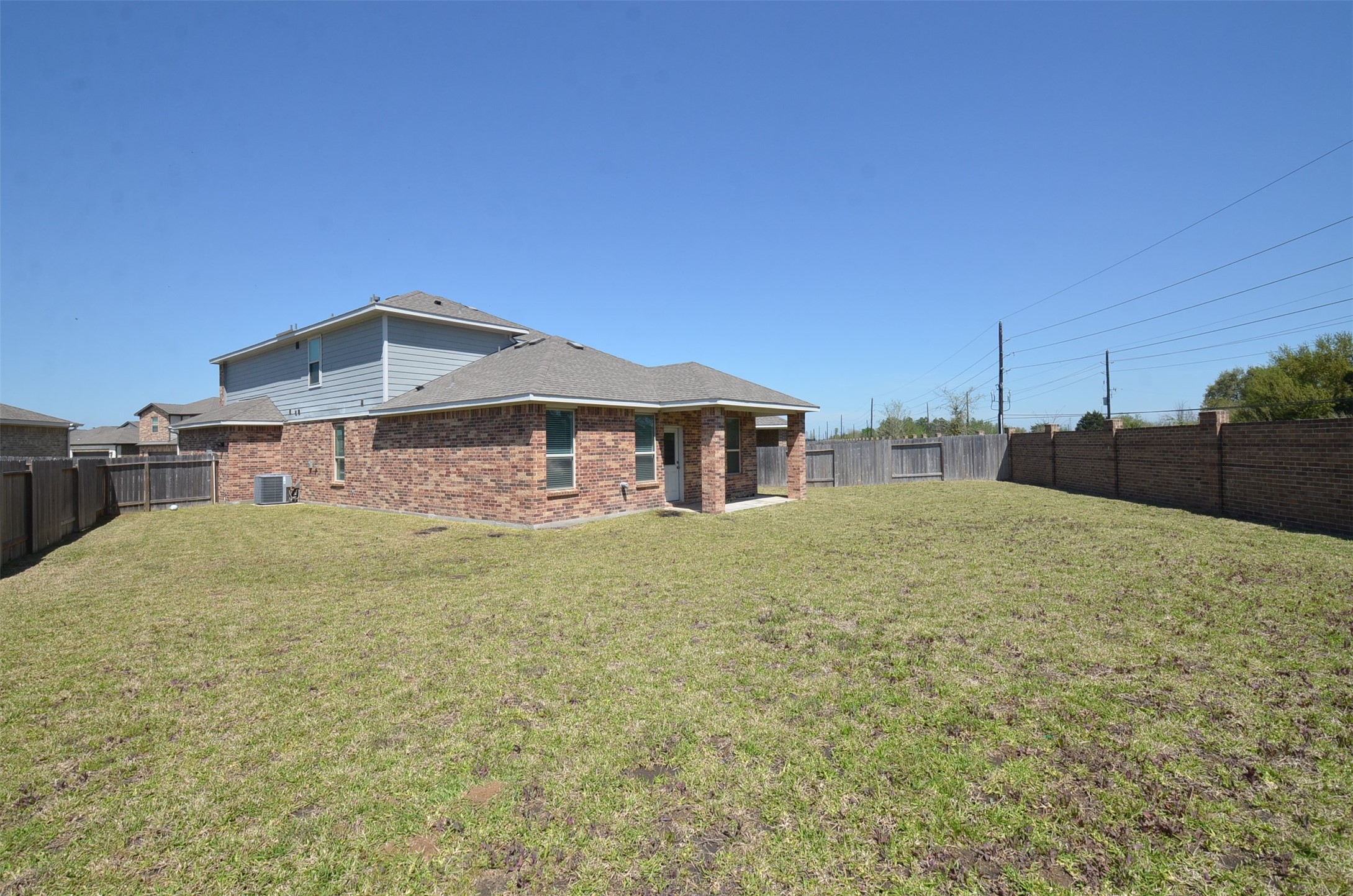 5602 Tabula Rasa Drive Katy, TX 77493 - Photo 35 of 38 a view of a house with a backyard