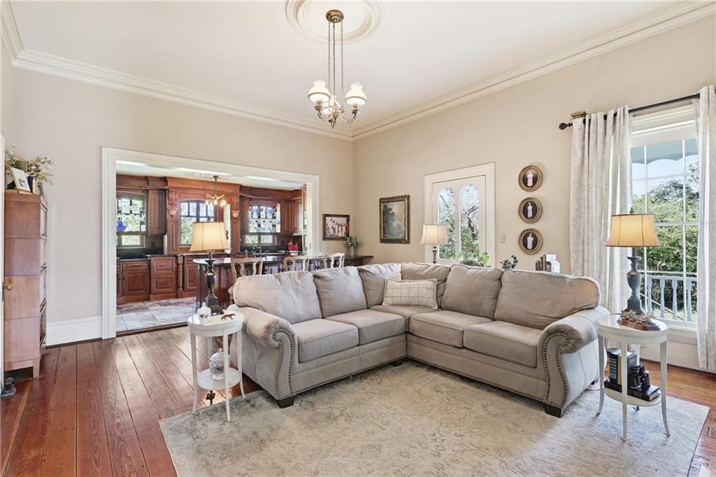 8075 Lakeview Road Statesboro, GA 30461 - Photo 15 of 46 a living room with furniture and a large window