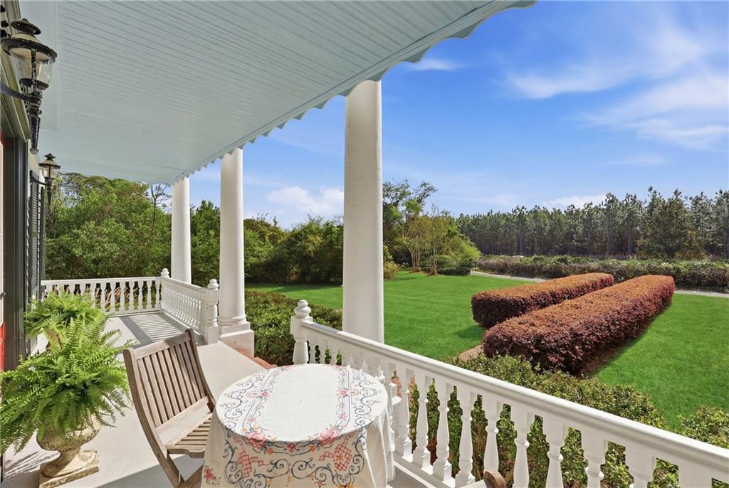 8075 Lakeview Road Statesboro, GA 30461 - Photo 4 of 46 a view of balcony with furniture and garden