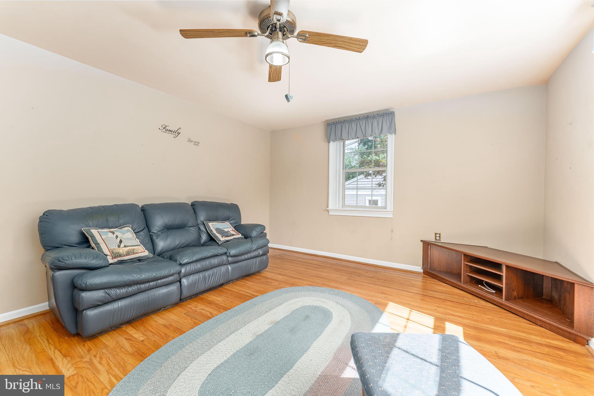 281 West Avenue Springfield, PA 19064 - Photo 27 of 51 a living room with furniture and a flat screen tv