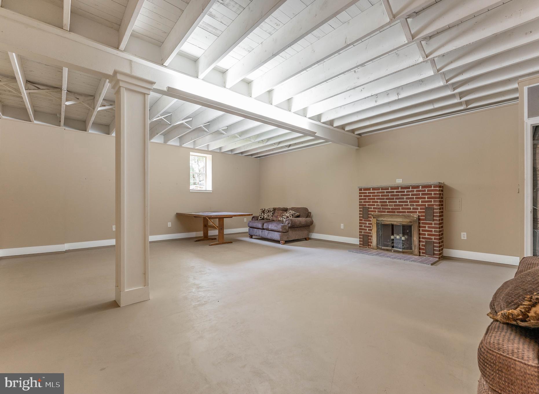 281 West Avenue Springfield, PA 19064 - Photo 42 of 51 a view of empty room with furniture and fireplace