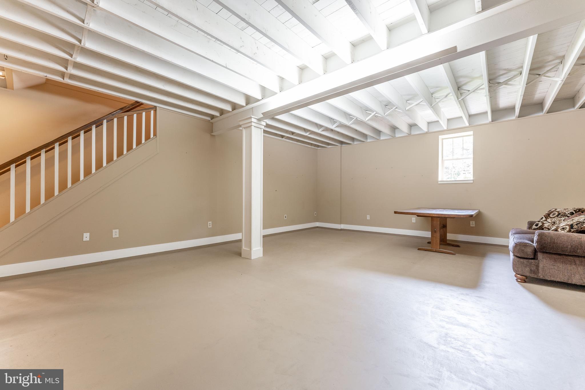 281 West Avenue Springfield, PA 19064 - Photo 43 of 51 a view of livingroom with stairs and furniture