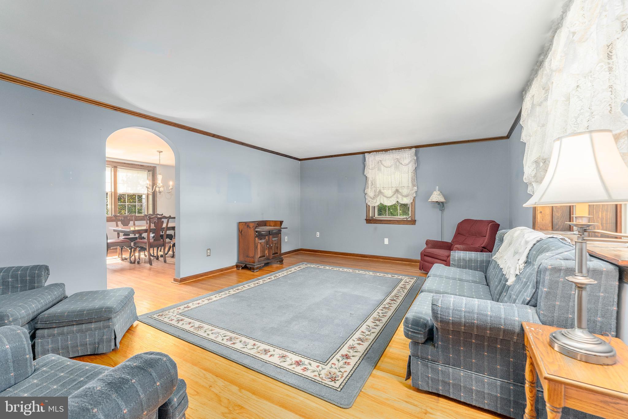 281 West Avenue Springfield, PA 19064 - Photo 7 of 51 a living room with furniture and a flat screen tv