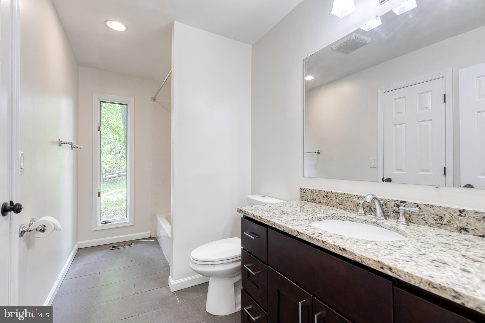 4105 Holbrook Road Randallstown, MD 21133 - Photo 22 of 28 Hall Bathroom