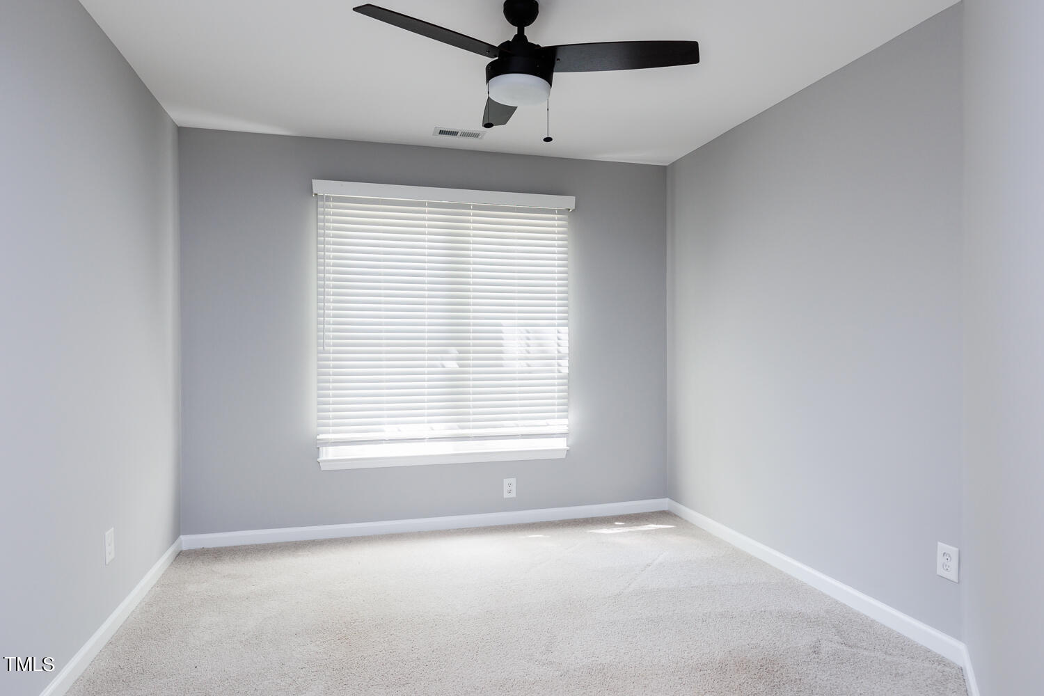 5120 Fairmead Circle Raleigh, NC 27613 - Photo 33 of 49 a view of an empty room with a window