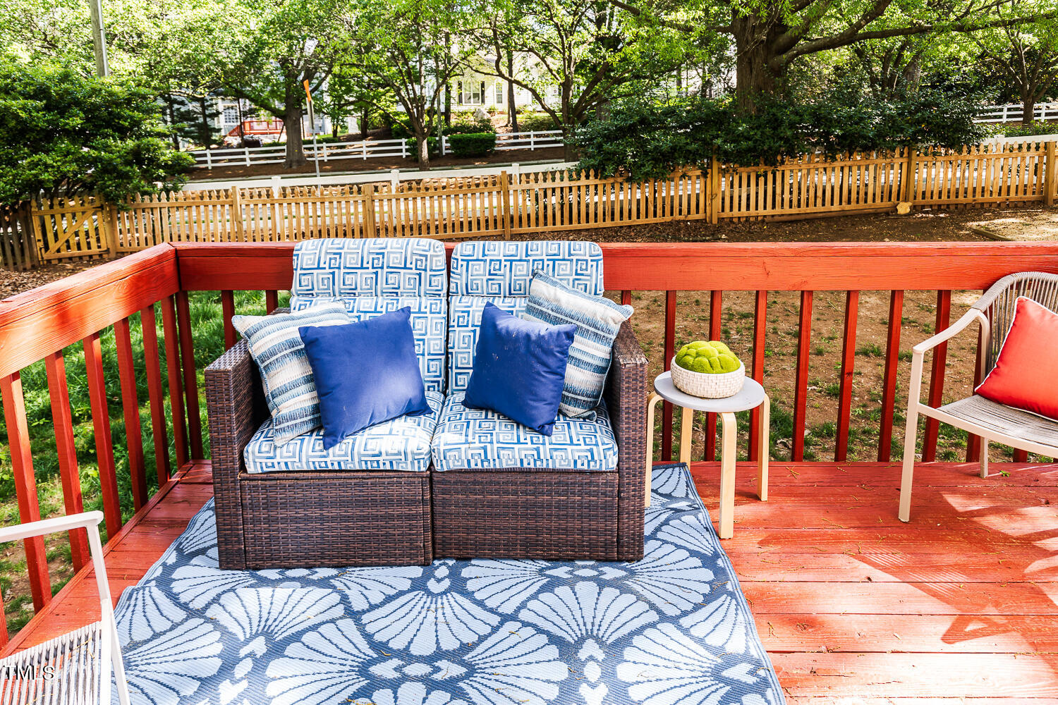 5120 Fairmead Circle Raleigh, NC 27613 - Photo 38 of 49 a outdoor sitting area with chairs and wooden floor