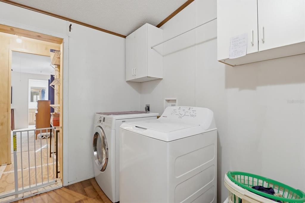 4950 West Mockingbird Street Homosassa, FL 34446 - Photo 27 of 47 a utility room with dryer and washer