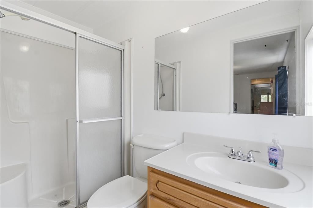 4950 West Mockingbird Street Homosassa, FL 34446 - Photo 30 of 47 a bathroom with a sink toilet and shower