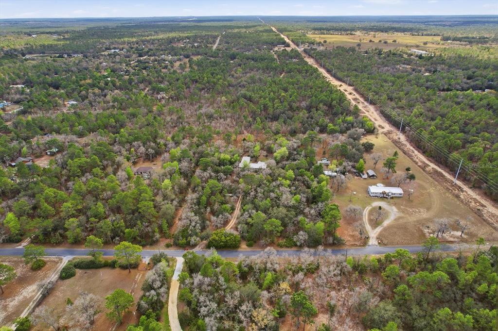 4950 West Mockingbird Street Homosassa, FL 34446 - Photo 42 of 47 a view of a yard with an outdoor space