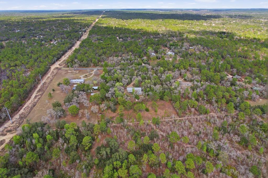 4950 West Mockingbird Street Homosassa, FL 34446 - Photo 43 of 47 a view of a field with an outdoor space