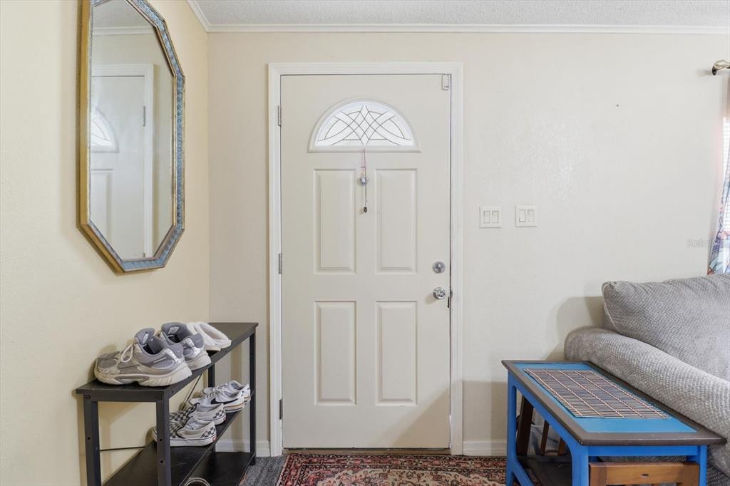 4950 West Mockingbird Street Homosassa, FL 34446 - Photo 7 of 47 a view of a livingroom with furniture and a couch