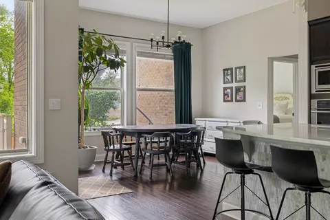a view of a dining room with furniture window and outside view