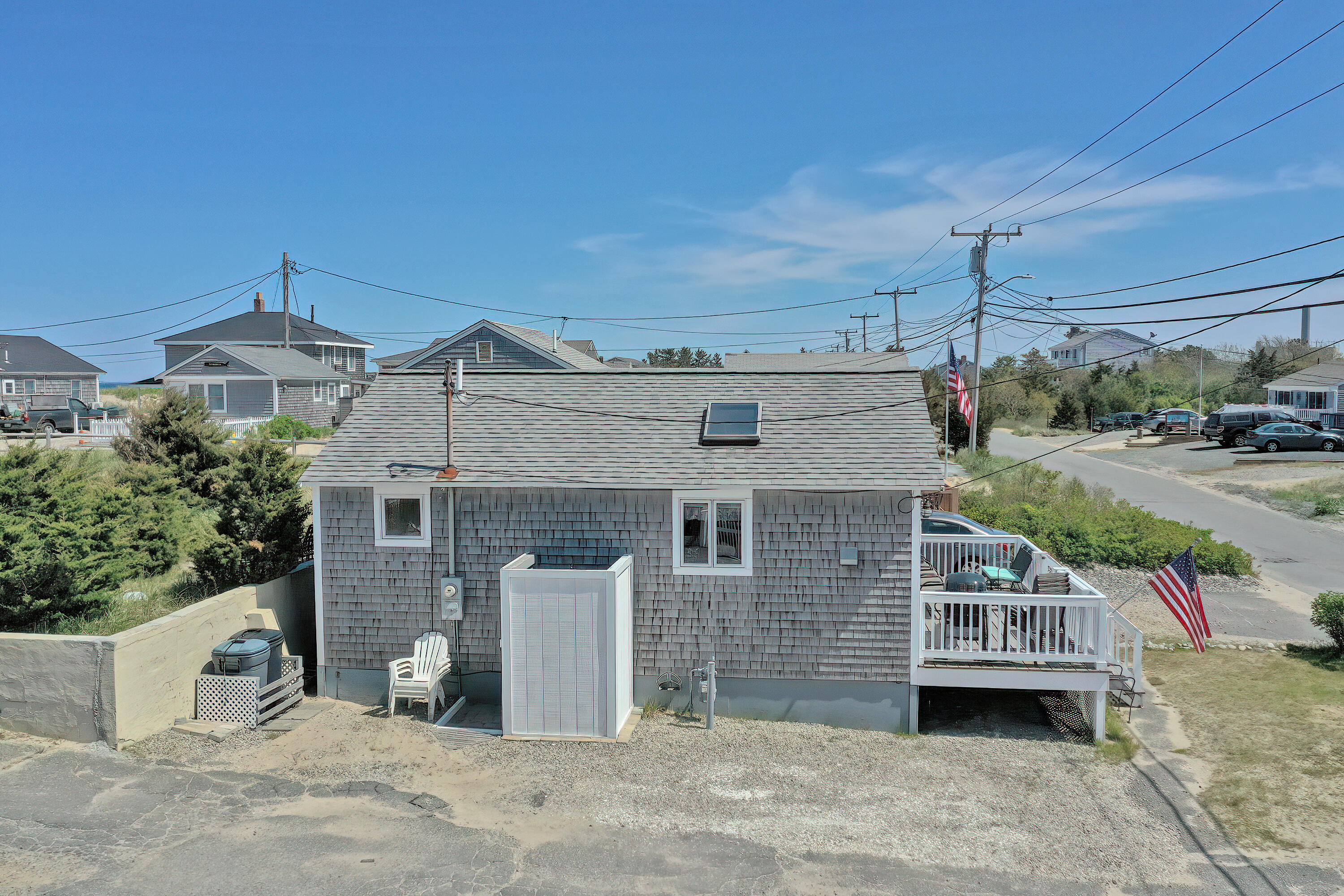 203 Phillips Road Sandwich, MA 02563 - Photo 18 of 40 a front view of a house with a yard
