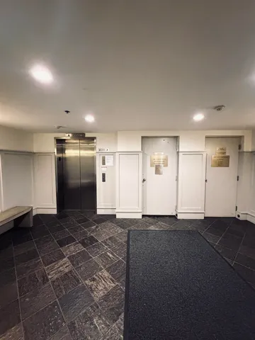 a view of a big room with a projector