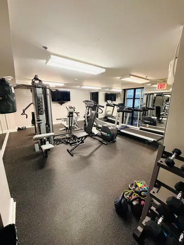 a view of a room with gym equipment