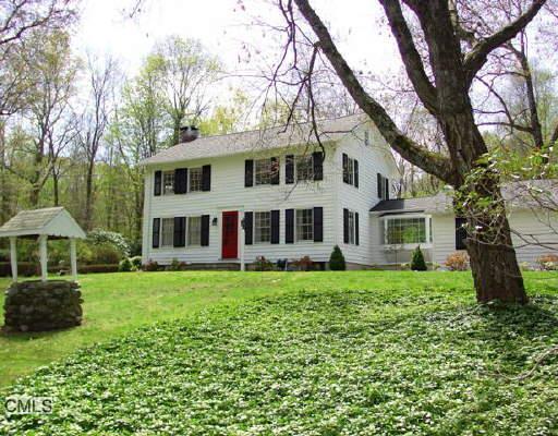 40 Signal Hill Road Wilton, CT 06897 - Photo 1 of 1 a house that has a tree in front of it
