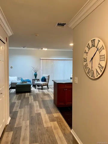 a view of a livingroom with furniture and window