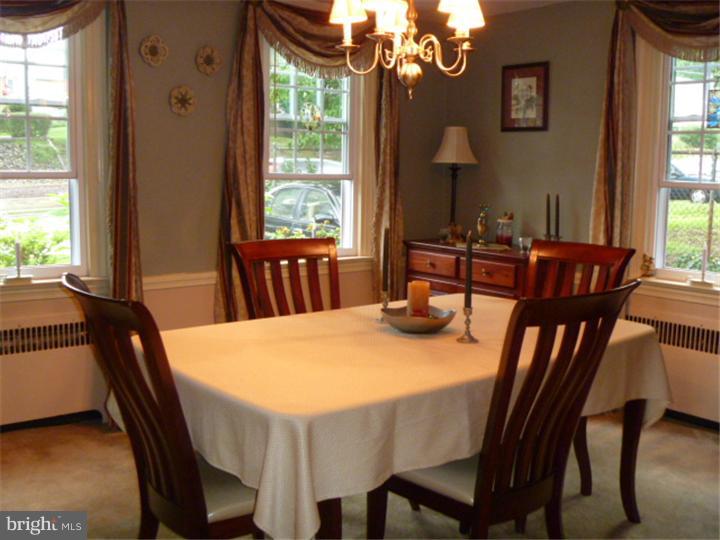 100 East Springfield Road Springfield, PA 19064 - Photo 9 of 21 a view of a dining room with furniture window and outside view