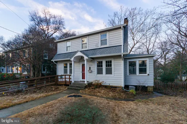 a front view of a house with yard