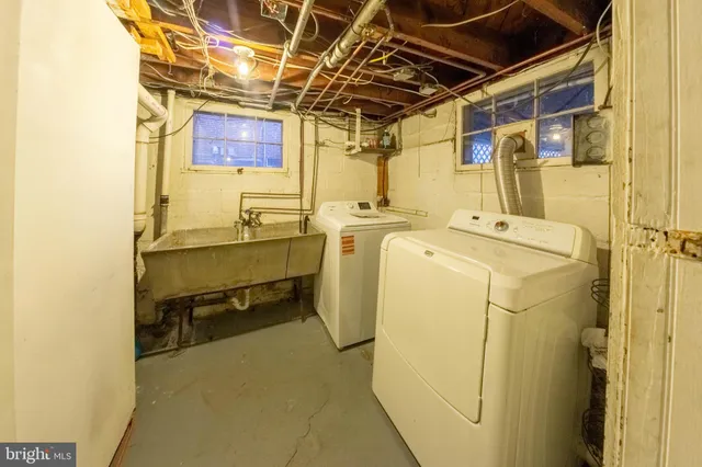 a view of a house with wooden deck