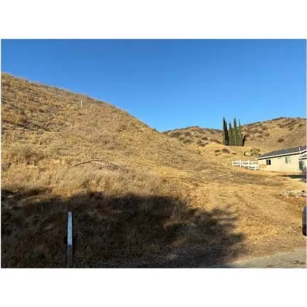 0 Driver Val Verde, CA 91384 - Photo 1 of 1 a black and white photo of a house