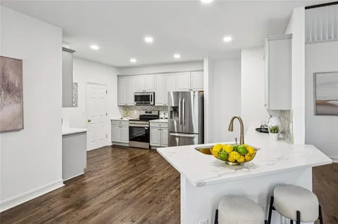 a bathroom with a toilet and a sink