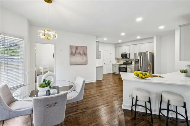 a view of a dining room and wooden floor