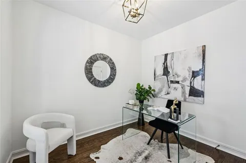 a view of balcony with wooden floor