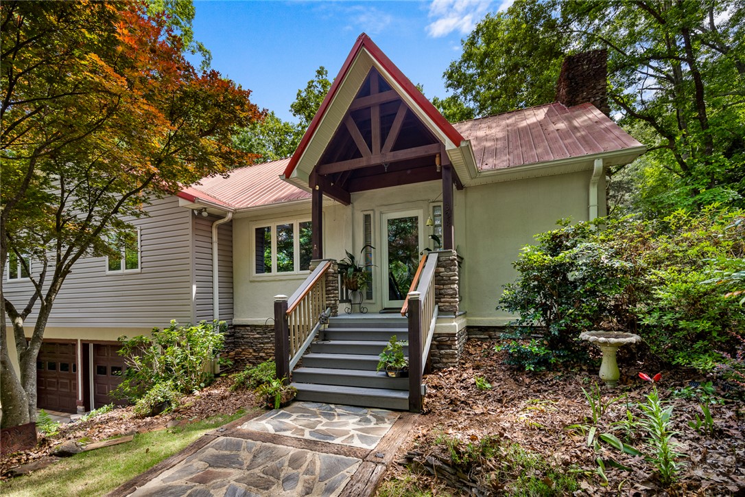 324 Hobson Road Anderson, SC 29621 - Photo 4 of 46 This charming home features a welcoming entrance and mature landscaping for natural appeal.