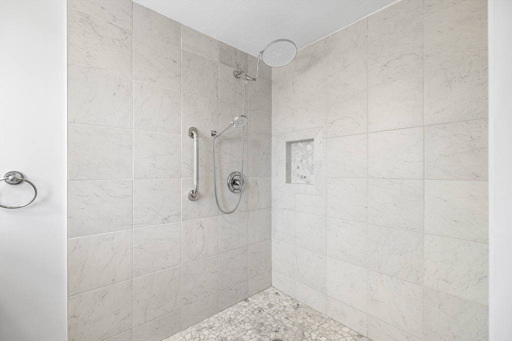 544 Shore Road, Unit 3 Truro, MA 02666 - Photo 23 of 30 a bathroom with a shower