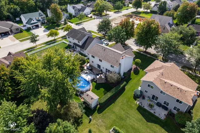 an aerial view of a house with a garden
