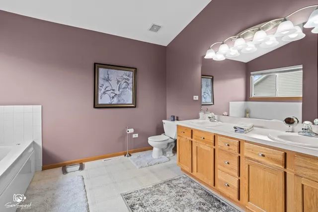 a living room with furniture and windows