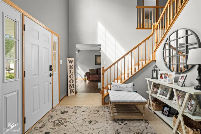 a view of an entryway with a front door